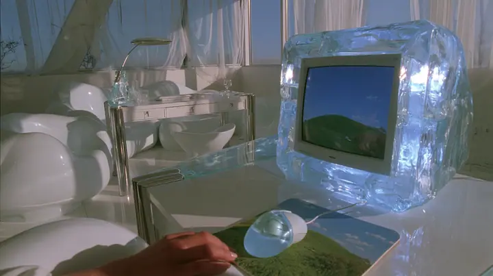 Y2K high fashion editorial photograph, 2001: first-person view from a chair at a 2001 high-fashion minimalist white loft apartment with molded white plastic furniture, a white lacquer desk, chrome and translucent…